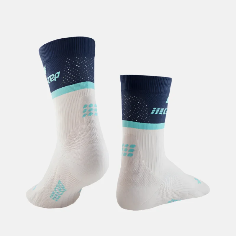 Cycling shorts with ventilated back-Cep The Run Ultralight Compression 4.0 Mid Cut Women's Socks -Blue/Off white